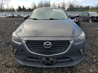 2017 Mazda CX-3 Touring with VIN JM1DKFC74H0176455, listed as a Copart auction lot 48825935 with 90,486 mi miles and Salvage Title. Bid and sale history available at carsss.com. Image 5.