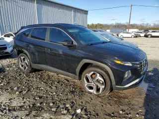 2022 Hyundai Tucson SEL with VIN 5NMJCCAE2NH014061, listed as a Copart auction lot 87253154 with 108,430 mi miles and Salvage Title. Bid and sale history available at carsss.com. Image 4.