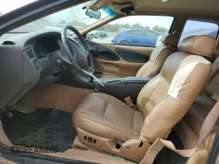 1996 Mercury Cougar z VIN 1MELM62W3TH600523, wystawiony jako Copart lot #78253454 z przebiegiem 84 531 mil mil oraz Tytuł czysty. Historia ofert i sprzedaży dostępna na DreamBid. Obrazek 7.