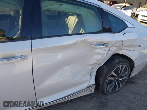2020 Honda Accord Touring with VIN 1HGCV3F93LA001214, listed as a IAAI auction lot 41408864 with 130,545 mi miles and . Bid and sale history available at DreamBid. Image 6.