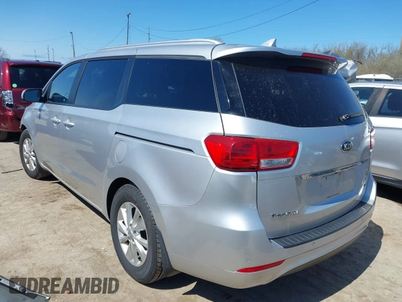 2016 Kia Sedona LX with VIN KNDMB5C12G6157582, listed as a IAAI auction lot 41932306 with 106,061 mi miles. Bid and sale history available at carsss.com. Image 3.