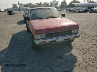 1989 Nissan Hardbody z VIN 1N6ND11S0KC342434, wystawiony jako Copart lot #71089274 z przebiegiem 300 076 mil mil oraz Szkody całkowita. Historia ofert i sprzedaży dostępna na DreamBid. Obrazek 11.
