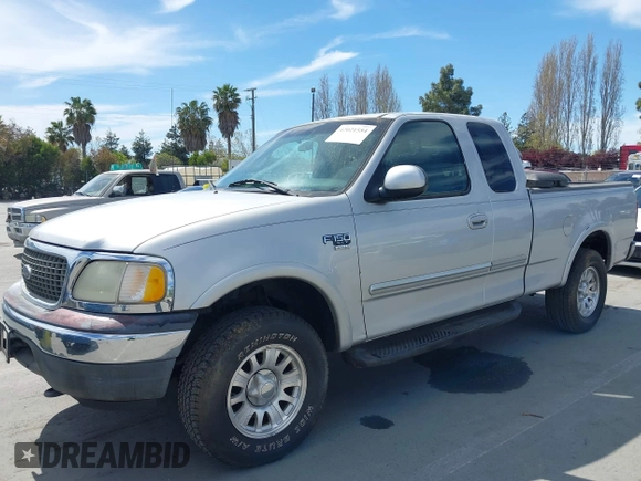 2001 Ford F-150 XL with VIN 1FTRX18L91KF29881, listed as a IAAI auction lot 42021554 with 199,041 mi miles. Bid and sale history available at carsss.com. Image 6.