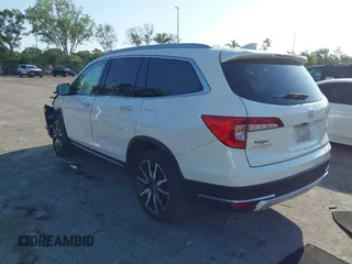 2019 Honda Pilot Touring 8-Passenger z VIN 5FNYF6H98KB016992, wystawiony jako IAAI lot #42275295 z przebiegiem 82 154 mil mil oraz . Historia ofert i sprzedaży dostępna na DreamBid. Obrazek 3.