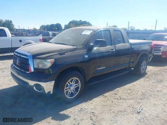 2010 Toyota Tundra 2WD Truck with VIN 5TFRM5F10AX010142, listed as a IAAI auction lot 40586543 with 280,387 mi miles. Bid and sale history available at carsss.com. Image 2.