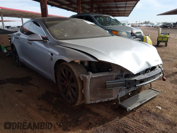 2014 Tesla Model S 60 with VIN 5YJSA1H17EFP35351, listed as a IAAI auction lot 41558434 with 151,002 mi miles and . Bid and sale history available at DreamBid. Image 1.