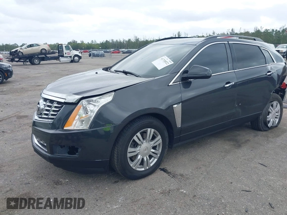 2015 Cadillac SRX with VIN 3GYFNAE30FS569009, listed as a IAAI auction lot 41718522 with 104,448 mi miles and . Bid and sale history available at DreamBid. Image 17.