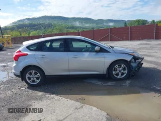 2012 Ford Focus SE z VIN 1FAHP3K27CL241013, wystawiony jako IAAI lot #42198812 z przebiegiem 121 888 mil mil oraz . Historia ofert i sprzedaży dostępna na DreamBid. Obrazek 14.