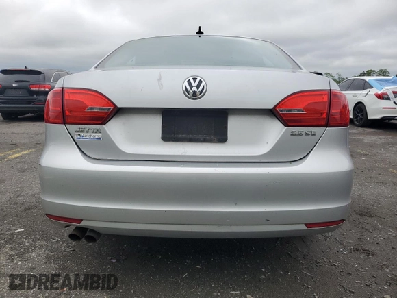 2011 Volkswagen Jetta SE with VIN 3VWDZ7AJ9BM320146, listed as a Copart auction lot 58521605 with 164,045 mi miles and Salvage title. Bid and sale history available at DreamBid. Image 6.
