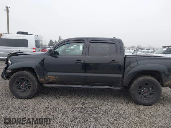 2014 Toyota Tacoma with VIN 3TMLU4EN4EM159363, listed as a IAAI auction lot 41337909 with 123,362 mi miles. Bid and sale history available at carsss.com. Image 14.