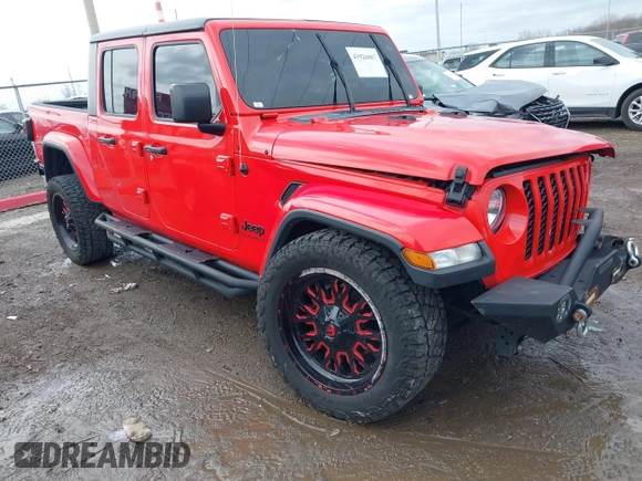 2021 Jeep Gladiator Freedom z VIN 1C6HJTAG0ML547293, wystawiony jako IAAI lot #41926067 z przebiegiem 57 696 mil mil oraz . Historia ofert i sprzedaży dostępna na DreamBid. Obrazek 1.