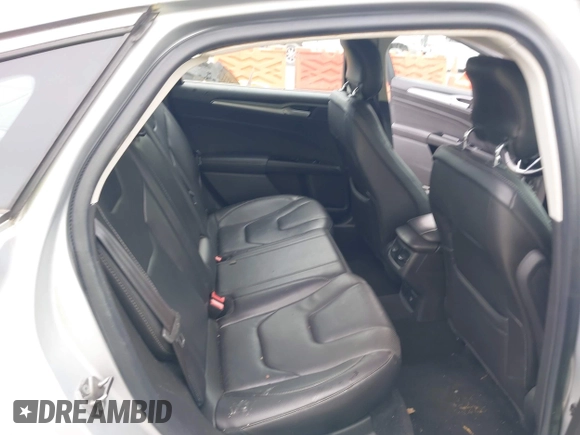 2013 Ford Fusion Titanium Hybrid with VIN 3FA6P0RU3DR281914, listed as a IAAI auction lot 42380838 with 166,956 mi miles and . Bid and sale history available at DreamBid. Image 8.