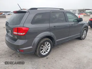 2015 Dodge Journey SXT with VIN 3C4PDCBG2FT649308, listed as a IAAI auction lot 42285409 with 140,668 mi miles and . Bid and sale history available at DreamBid. Image 4.