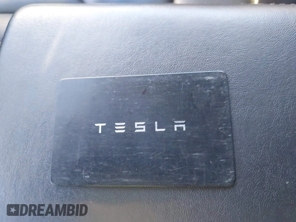 2022 Tesla Model 3 Long Range with VIN 5YJ3E1EB0NF212257, listed as a IAAI auction lot 41735989 with 28,528 mi miles and . Bid and sale history available at DreamBid. Image 11.