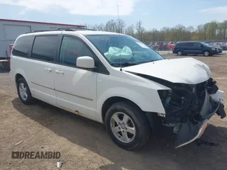 2010 Dodge Grand Caravan SXT z VIN 2D4RN5D11AR342009, wystawiony jako IAAI lot #42147655 z przebiegiem 108 598 mil mil oraz . Historia ofert i sprzedaży dostępna na DreamBid. Obrazek 1.