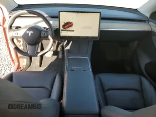 2023 Tesla Model Y Long Range with VIN 7SAYGDEE7PA044888, listed as a Copart auction lot 48538335 with 25,621 mi miles and Salvage Title. Bid and sale history available at DreamBid. Image 8.