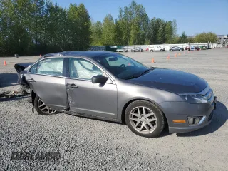 2011 Ford Fusion SEL with VIN 3FAHP0JG2BR330645, listed as a Copart auction lot 54161915 with 217,558 mi miles and Salvage Title. Bid and sale history available at carsss.com. Image 4.