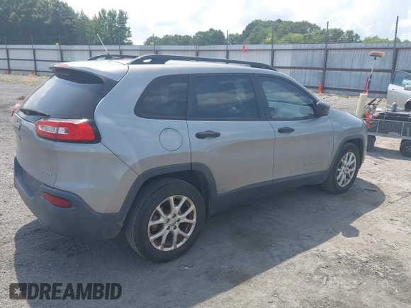 2015 Jeep Cherokee Sport z VIN 1C4PJLABXFW684235, wystawiony jako IAAI lot #42788242 z przebiegiem 260 453 mil mil oraz . Historia ofert i sprzedaży dostępna na DreamBid. Obrazek 4.