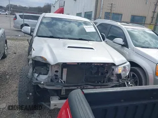 2012 Toyota Tacoma with VIN 3TMLU4ENXCM083340, listed as a IAAI auction lot 41704584 with 120,944 mi miles and . Bid and sale history available at DreamBid. Image 12.