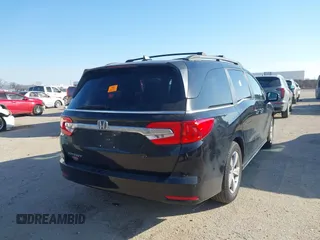 2018 Honda Odyssey EX-L z VIN 5FNRL6H74JB031306, wystawiony jako IAAI lot #41603478 z przebiegiem Nie podano mil oraz . Historia ofert i sprzedaży dostępna na DreamBid. Obrazek 4.