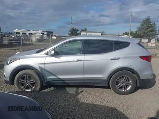 2017 Hyundai Santa Fe 2.4L with VIN 5XYZTDLB7HG444081, listed as a IAAI auction lot 42207558 with 119,054 mi miles and . Bid and sale history available at DreamBid. Image 14.