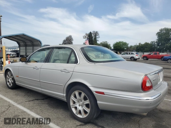 2004 Jaguar XJ Vanden Plas with VIN SAJWA74C04SG25291, listed as a Copart auction lot 56678255 with 176,597 mi miles and Clean Title. Bid and sale history available at DreamBid. Image 2.