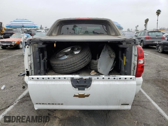 2010 Chevrolet Avalanche with VIN 3GNNCEE04AG153259, listed as a Copart auction lot 86007974 with 175,836 mi miles and Salvage Title. Bid and sale history available at DreamBid. Image 6.