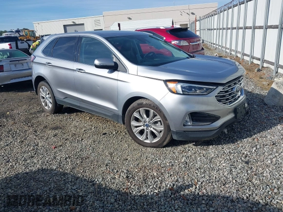2022 Ford Edge Titanium z VIN 2FMPK4K95NBA38997, wystawiony jako IAAI lot #41467300 z przebiegiem 74 310 mil mil oraz . Historia ofert i sprzedaży dostępna na DreamBid. Obrazek 1.