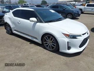 2014 Scion tC z VIN JTKJF5C76E3085000, wystawiony jako IAAI lot #42289497 z przebiegiem 105 066 mil mil oraz . Historia ofert i sprzedaży dostępna na DreamBid. Obrazek 1.