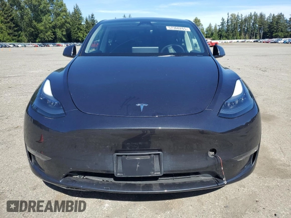 2024 Tesla Model Y Long Range with VIN 7SAYGDEE9RF120729, listed as a Copart auction lot 57360265 with 21,589 mi miles and Salvage title. Bid and sale history available at DreamBid. Image 5.