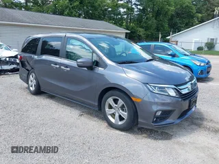 2019 Honda Odyssey EX-L z VIN 5FNRL6H73KB028981, wystawiony jako IAAI lot #42576811 z przebiegiem 86 927 mil mil oraz . Historia ofert i sprzedaży dostępna na DreamBid. Obrazek 1.