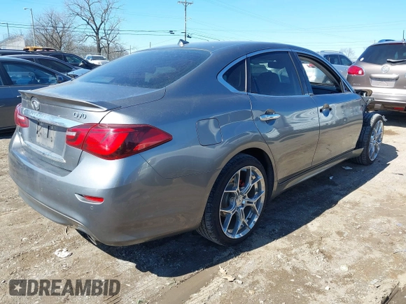 2018 Infiniti Q70 Luxe with VIN JN1BY1AR6JM220065, listed as a IAAI auction lot 41665033 with 135,905 mi miles and . Bid and sale history available at DreamBid. Image 4.