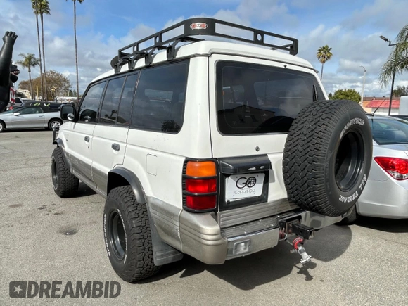 1997 Mitsubishi Montero z VIN JA4MR41R3VJ007919, wystawiony jako Copart lot #51544685 z przebiegiem 268 046 mil mil oraz Czysty tytuł • Clean title. Historia ofert i sprzedaży dostępna na DreamBid. Obrazek 3.