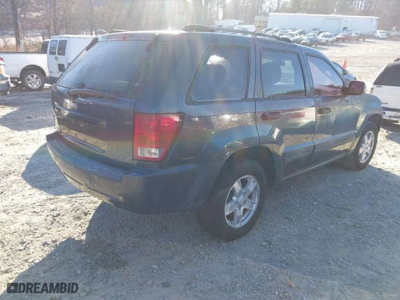 2006 Jeep Grand Cherokee Laredo with VIN 1J8GS48K86C348389, listed as a IAAI auction lot 41187321 with 166,275 mi miles. Bid and sale history available at carsss.com. Image 4.
