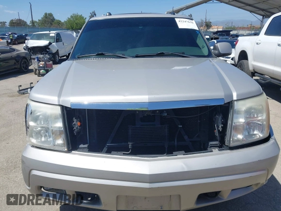 2005 Cadillac Escalade z VIN 1GYEC63N65R249827, wystawiony jako IAAI lot #42247650 z przebiegiem 254 052 mil mil oraz . Historia ofert i sprzedaży dostępna na DreamBid. Obrazek 13.
