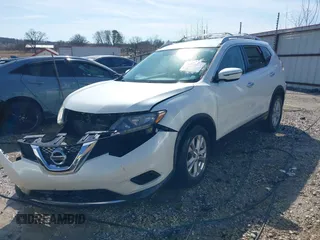 2016 Nissan Rogue SV with VIN KNMAT2MV6GP648053, listed as a IAAI auction lot 41536017 with 127,951 mi miles and . Bid and sale history available at carsss.com. Image 2.