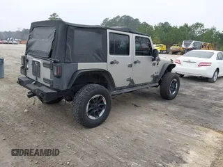 2007 Jeep Wrangler Unlimited X with VIN 1J4GA391X7L107424, listed as a IAAI auction lot 41752013 with 196,557 mi miles and . Bid and sale history available at DreamBid. Image 4.