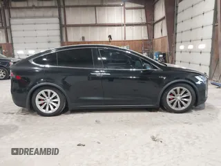 2019 Tesla Model X P90D with VIN 5YJXCAE4XKF180356, listed as a IAAI auction lot 42087926 with 79,041 mi miles. Bid and sale history available at carsss.com. Image 12.
