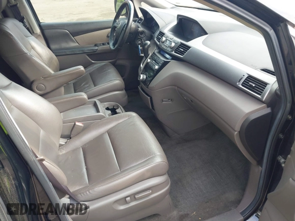 2011 Honda Odyssey EX-L with VIN 5FNRL5H68BB071178, listed as a IAAI auction lot 42286324 with 213,847 mi miles and . Bid and sale history available at DreamBid. Image 5.