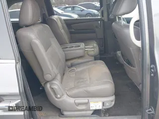 2014 Honda Odyssey Touring with VIN 5FNRL5H94EB020257, listed as a IAAI auction lot 41924245 with 204,526 mi miles and . Bid and sale history available at DreamBid. Image 8.