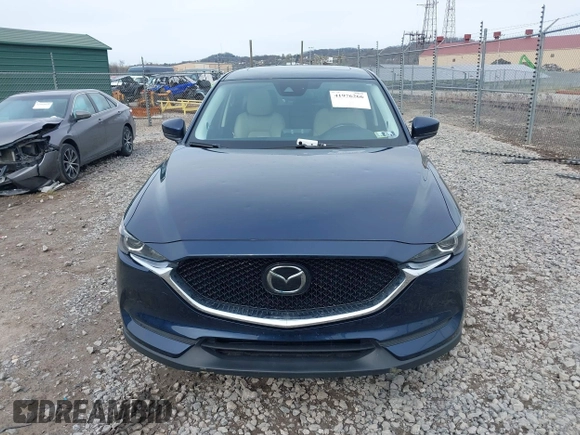 2019 Mazda CX-5 Touring with VIN JM3KFBCM5K0689948, listed as a IAAI auction lot 41976266 with 74,812 mi miles. Bid and sale history available at carsss.com. Image 12.
