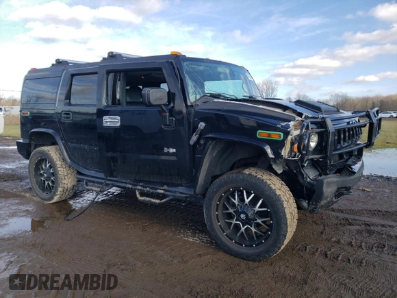 2005 Hummer H2 SUV with VIN 5GRGN23U35H111403, listed as a Copart auction lot 84720994 with 142,159 mi miles and Salvage Title. Bid and sale history available at carsss.com. Image 4.
