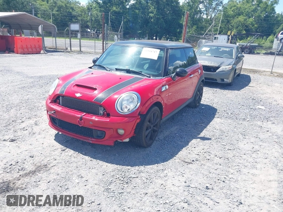 2013 MINI Hardtop S with VIN WMWSV3C50DT476088, listed as a IAAI auction lot 42534717 with 130,565 mi miles and . Bid and sale history available at DreamBid. Image 2.