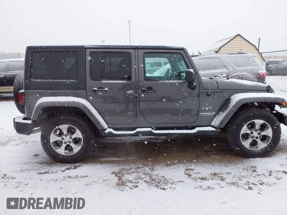2017 Jeep Wrangler Unlimited Sahara with VIN 1C4BJWEG4HL591149, listed as a IAAI auction lot 41542157 with 70,630 mi miles. Bid and sale history available at carsss.com. Image 13.