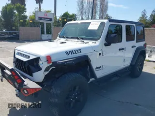 2022 Jeep Wrangler Unlimited Sport S with VIN 1C4HJXDG7NW144634, listed as a IAAI auction lot 41975242 with 29,336 mi miles. Bid and sale history available at carsss.com. Image 6.