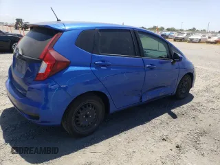 2020 Honda Fit LX z VIN 3HGGK5H43LM715970, wystawiony jako Copart lot #58864625 z przebiegiem 70 351 mil mil oraz Szkoda całkowita • Salvage title. Historia ofert i sprzedaży dostępna na DreamBid. Obrazek 3.
