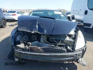 2005 Toyota Celica GT z VIN JTDDR32T950182529, wystawiony jako IAAI lot #42466018 z przebiegiem Nie podano mil oraz . Historia ofert i sprzedaży dostępna na DreamBid. Obrazek 13.