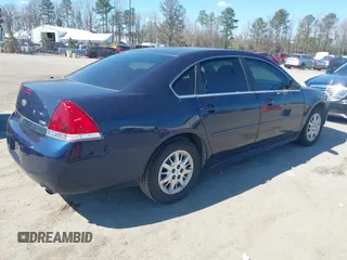 2011 Chevrolet Impala Police Police with VIN 2G1WD5EM9B1165441, listed as a IAAI auction lot 41871506 with 138,810 mi miles. Bid and sale history available at carsss.com. Image 4.