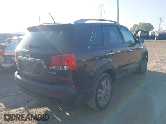 2011 Kia Sorento EX with VIN 5XYKUDA26BG059278, listed as a IAAI auction lot 42236023 with 197,740 mi miles and . Bid and sale history available at DreamBid. Image 4.