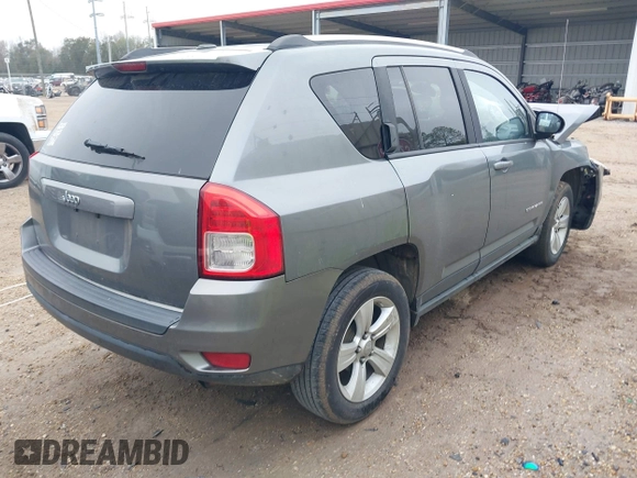 2012 Jeep Compass Sport with VIN 1C4NJCBB7CD664599, listed as a IAAI auction lot 41180829 with 144,909 mi miles. Bid and sale history available at carsss.com. Image 4.